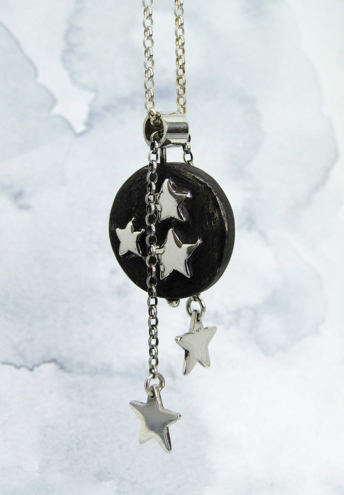 Illuminate pendant. Handmade solid silver pendant with highly polished star detail within a blackened disc.. Music jewellery. Music jewelry. Irish design. Moveable art