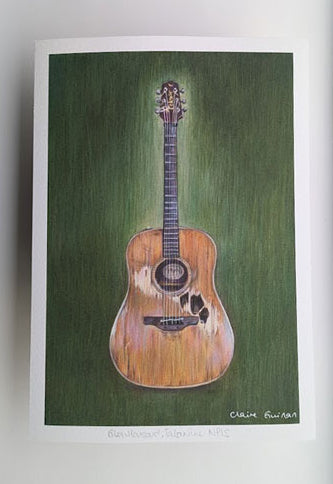 A print of Glen Hansard's from the Frames guitar